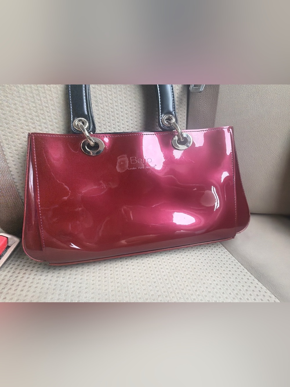 Beijo Metallic wine colored Shoulder Bag with Black Handles